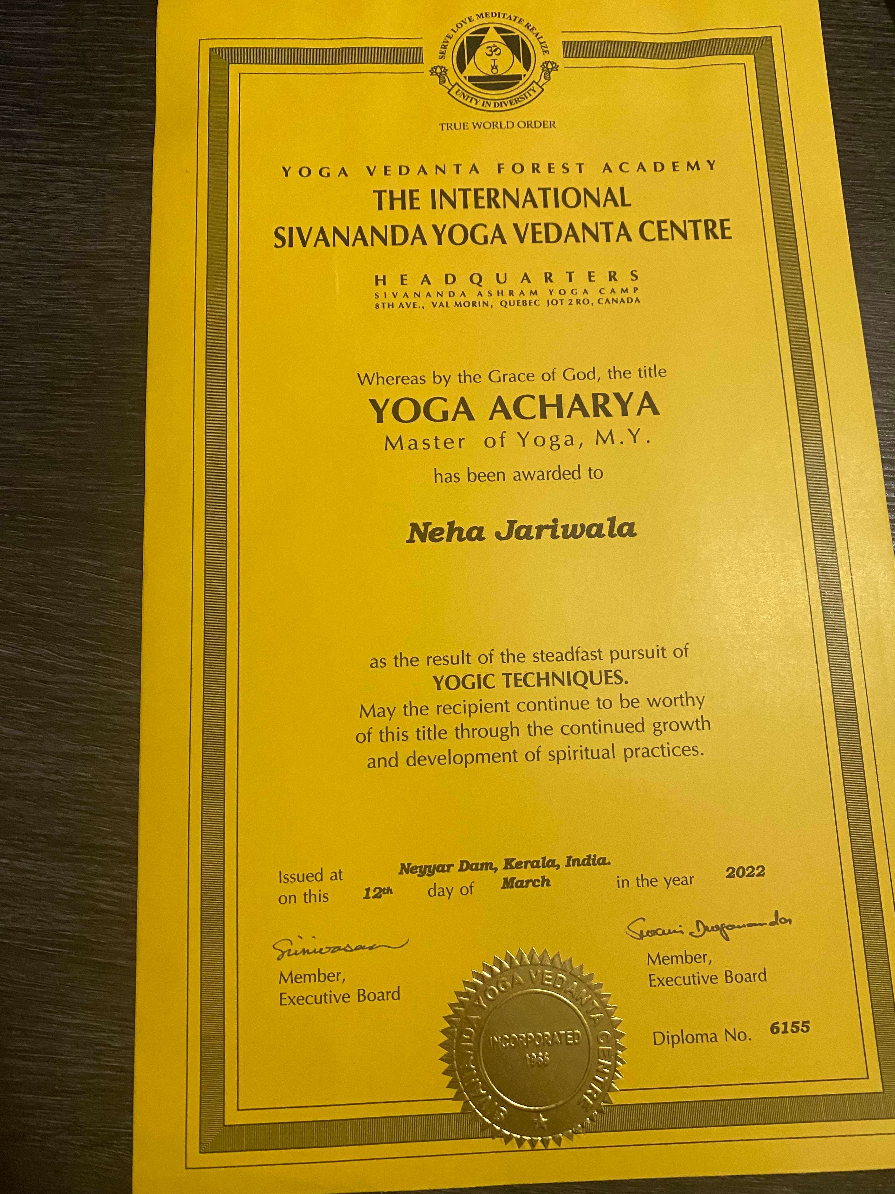 Woman seated on yoga mat