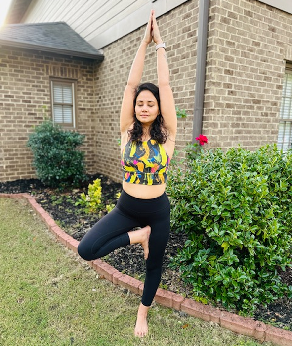 Woman in tree pose
